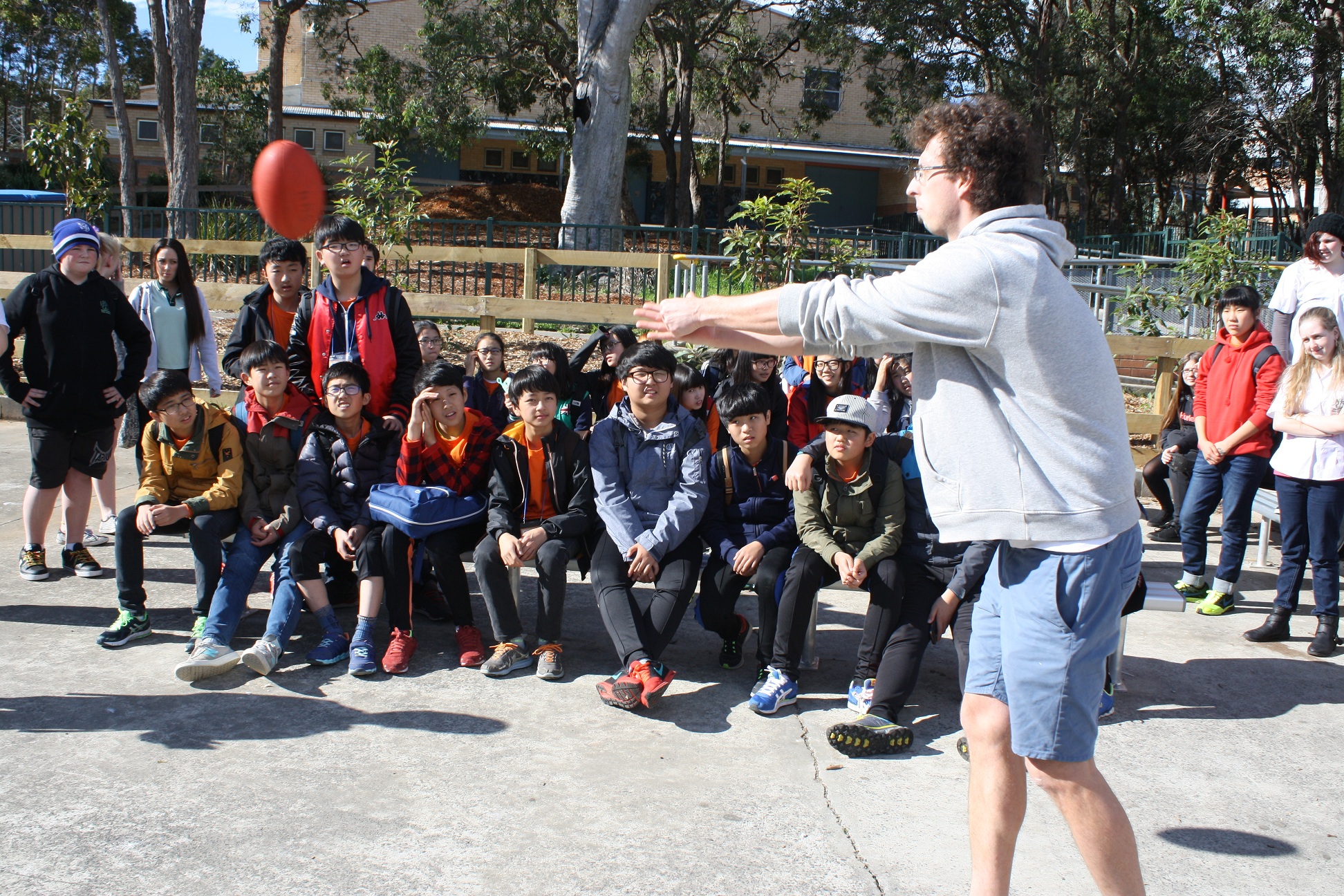 Mr McKinnon showing off his AFL skills